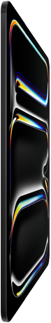 iPad Pro, front exterior, space black color, aluminum and glass enclosure, thin profile, tilted back with display showing multicolored line art